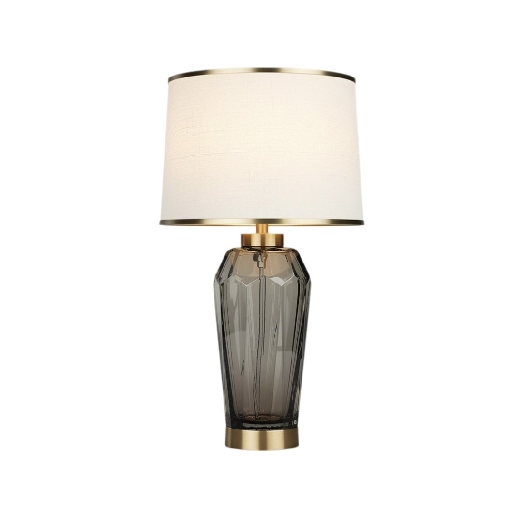 **Lampe de table moderne en verre fumé avec abat-jour en tissu blanc et finition dorée**